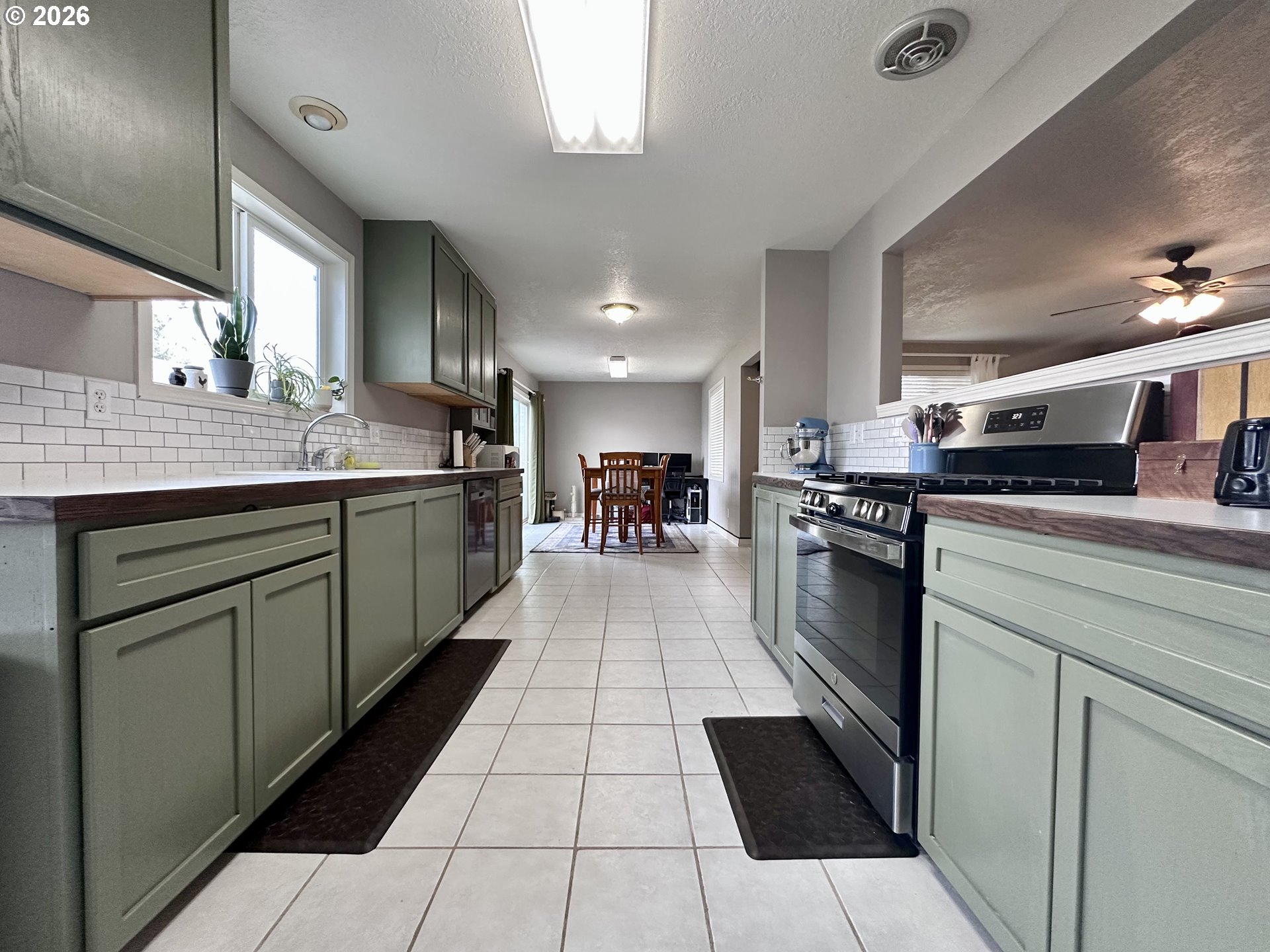 169 West Chestnut Street Union, OR 97883 - Photo 16 of 35 a kitchen with stainless steel appliances granite countertop a sink and cabinets