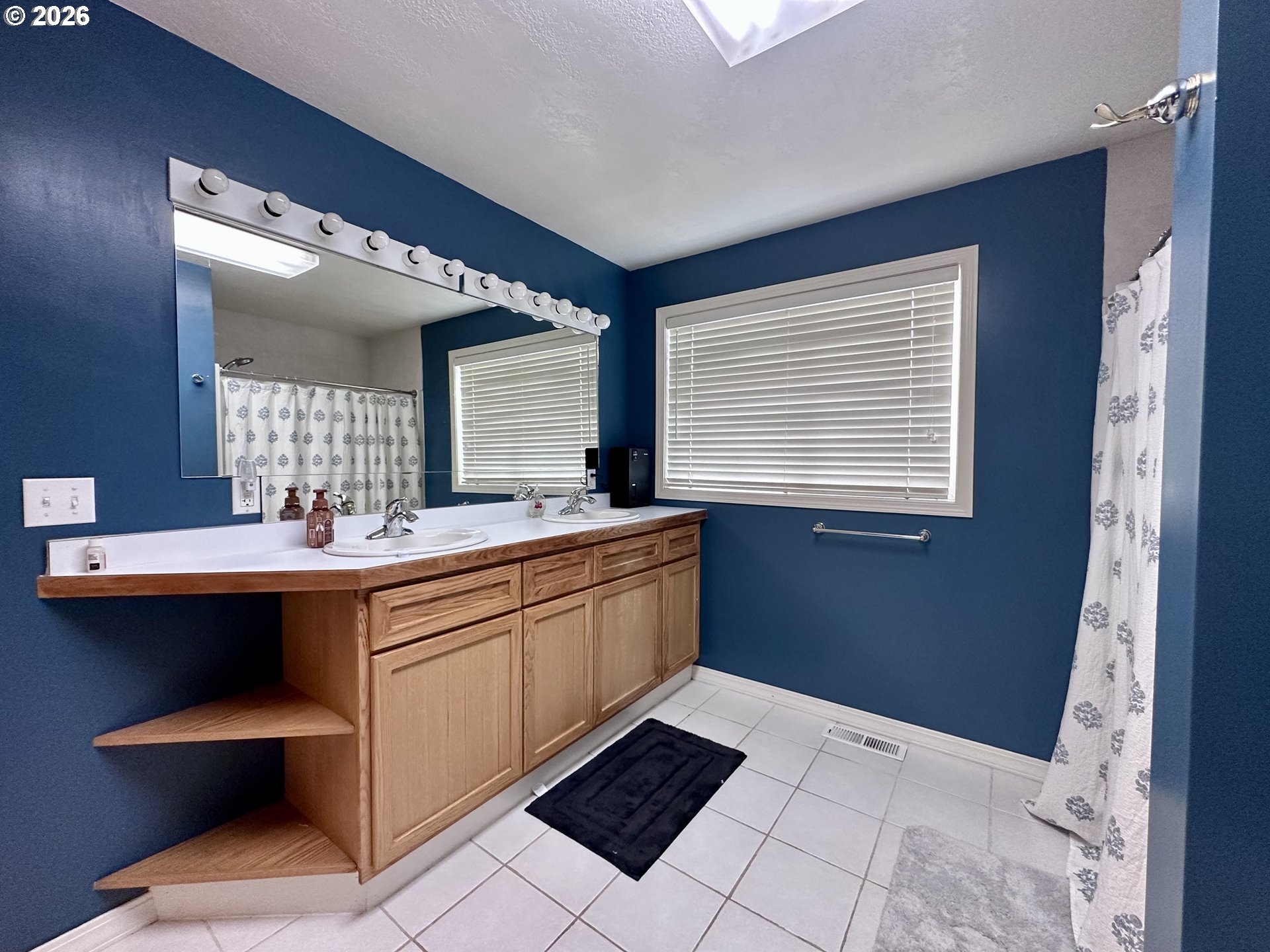 169 West Chestnut Street Union, OR 97883 - Photo 23 of 35 a kitchen with stainless steel appliances kitchen island sink stove and mirror