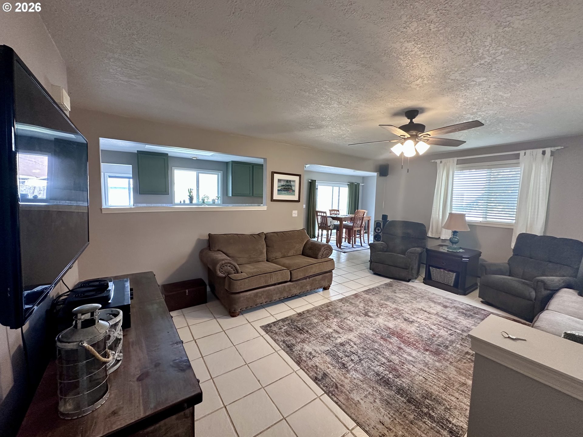 169 West Chestnut Street Union, OR 97883 - Photo 5 of 35 a living room with furniture and a chandelier