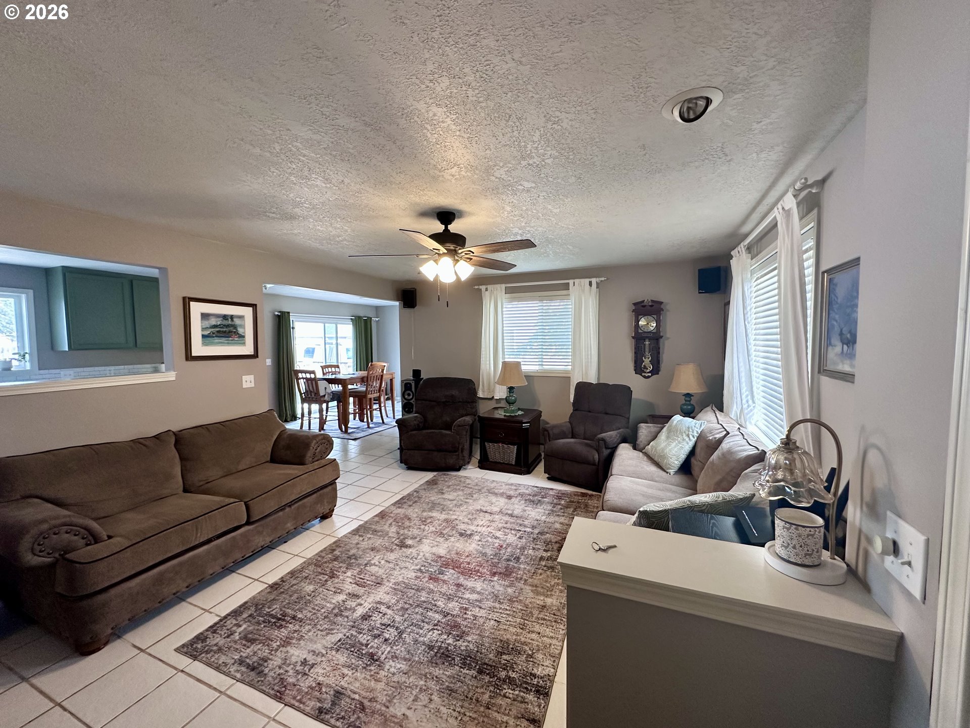 169 West Chestnut Street Union, OR 97883 - Photo 6 of 35 a living room with furniture and a chandelier