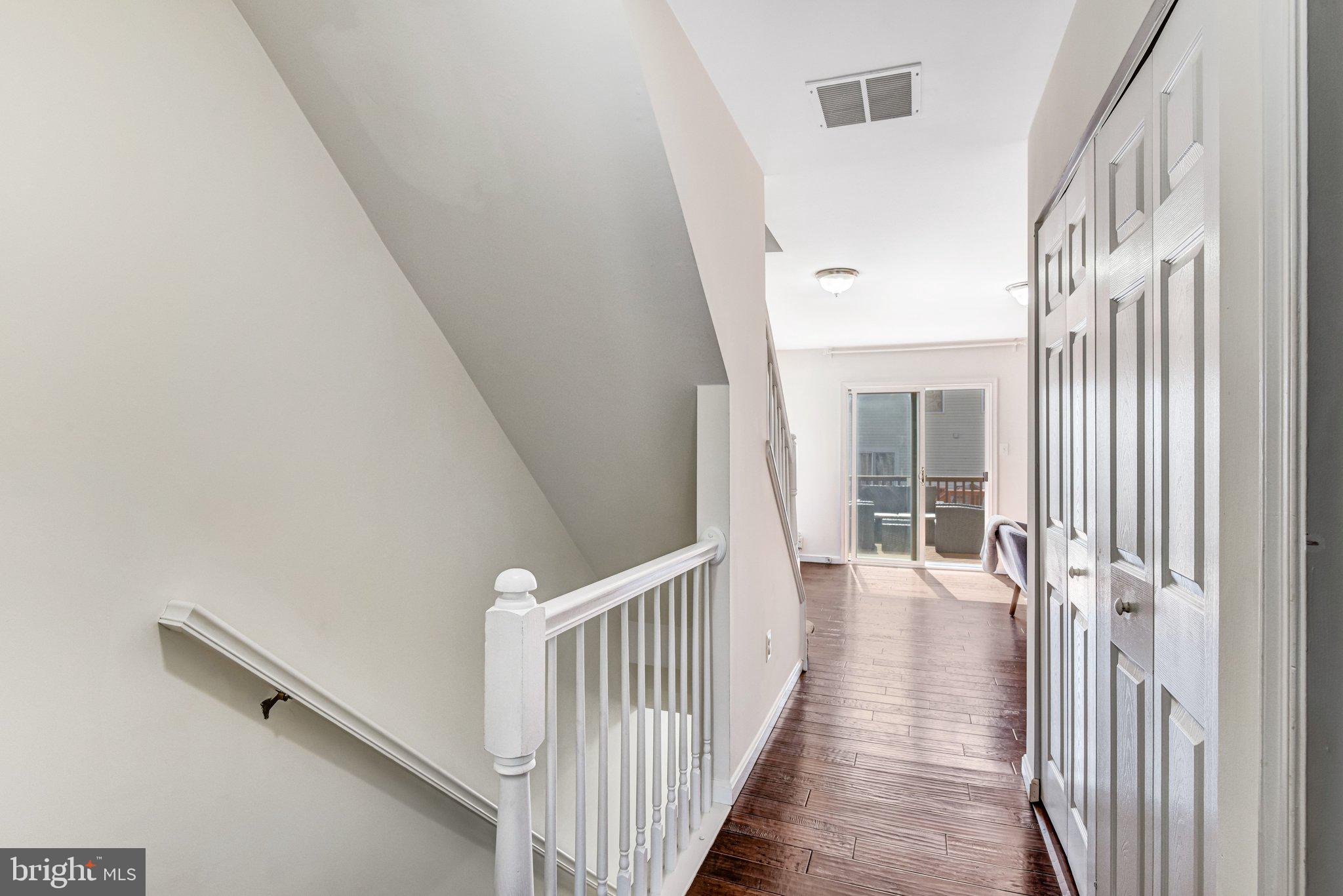 42847 Pilgrim Square Chantilly, VA 20152 - Photo 18 of 34 Inviting hallway with natural light.