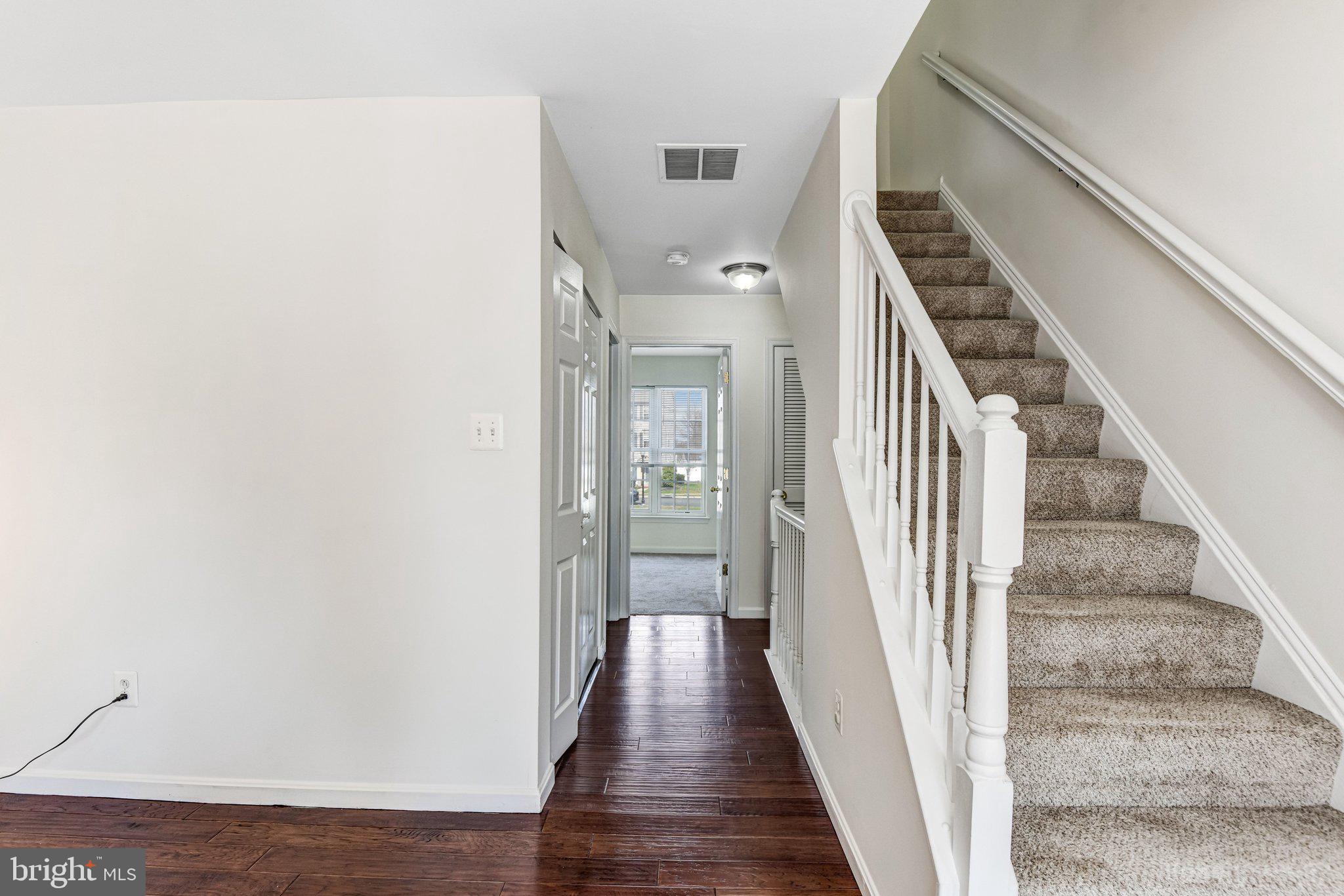 42847 Pilgrim Square Chantilly, VA 20152 - Photo 21 of 34 Inviting entryway with staircase charm.