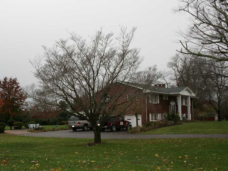 267 Isle Road Butler, PA 16001 - Photo 13 of 13 Parking Lot/Garage. Large garage with 2 separate doors ....wide, extra large driveway offers ample room for parking/turning!