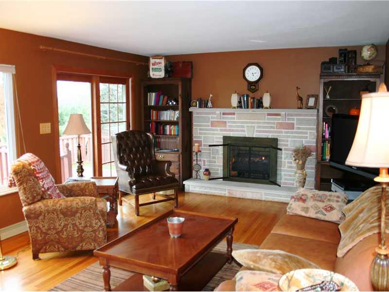 267 Isle Road Butler, PA 16001 - Photo 3 of 13 Family Room. Large walkout family room with hardwood floors and brick fireplace (gas start) which can be log-burning or you can add gas logs to it. Large windows with cellular blinds.