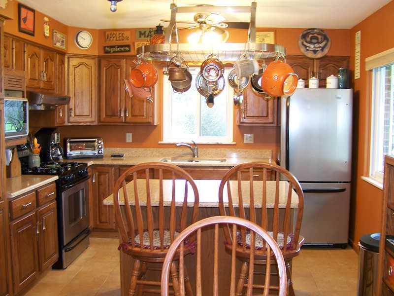 267 Isle Road Butler, PA 16001 - Photo 4 of 13 Kitchen. Generous counterspace (granite), custom cabinetry, and stainless steel appliances make this kitchen a joy to congregate in!
