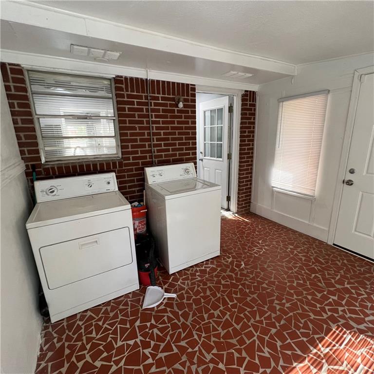1083 Center Street Southwest, Unit A Mableton, GA 30126 - Photo 14 of 18 a utility room with dryer and washer