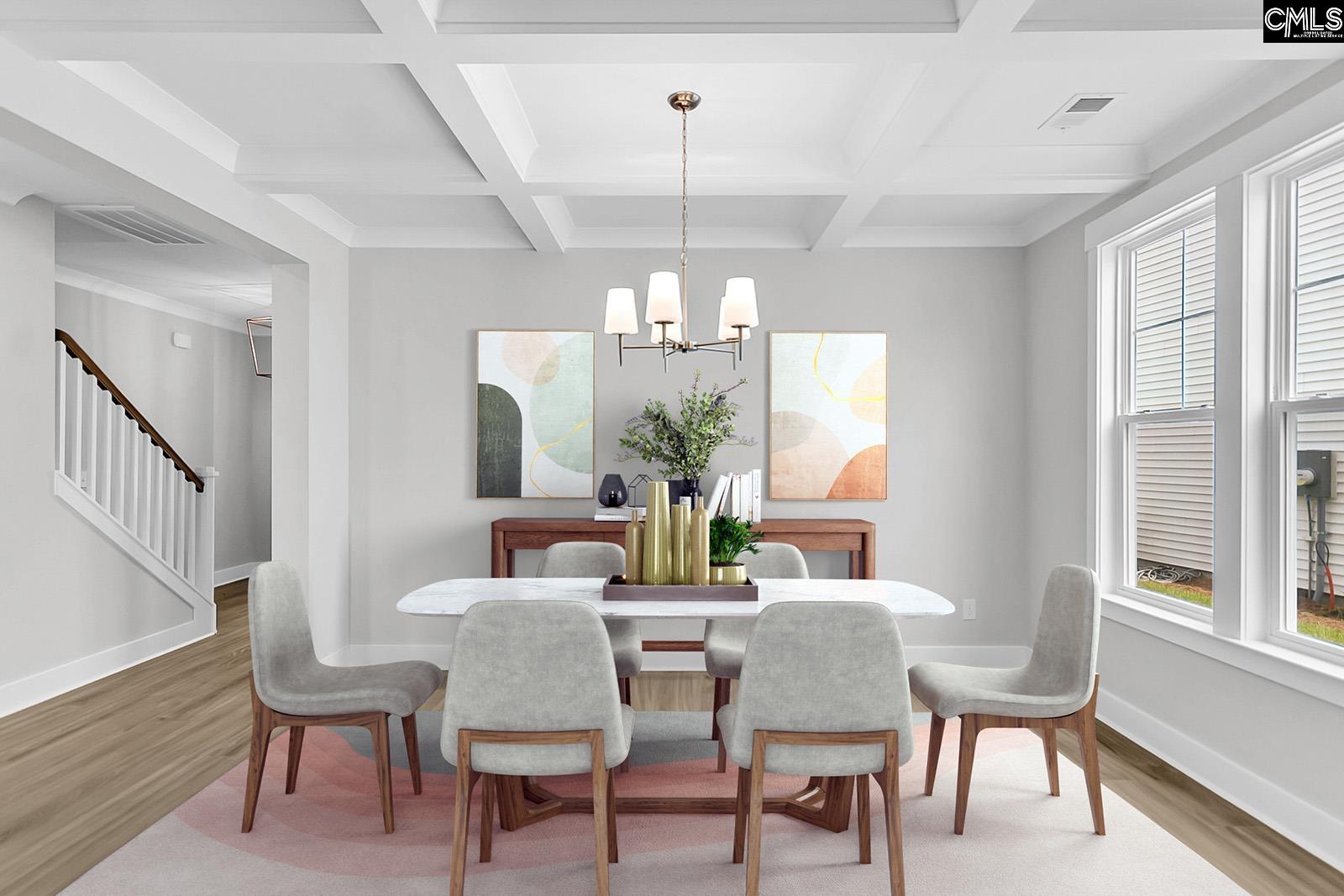 637 Falling Leaf Lane Chapin, SC 29036 - Photo 7 of 14 a dining room with furniture a chandelier and wooden floor