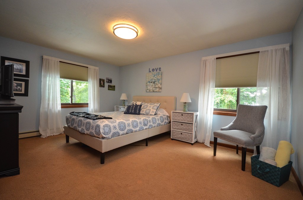 66 Dodge Hill Road Sutton, MA 01590 - Photo 12 of 29 a bedroom with a bed and a couch