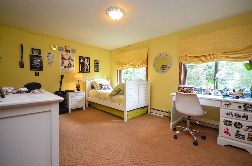 66 Dodge Hill Road Sutton, MA 01590 - Photo 15 of 29 a bedroom with furniture and a window