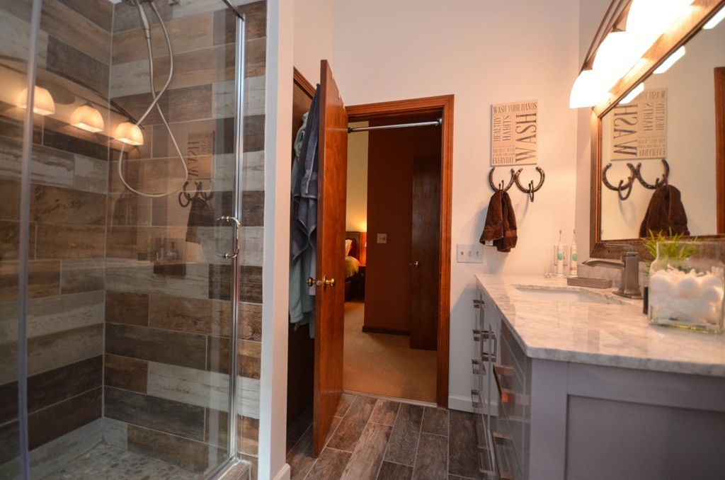 66 Dodge Hill Road Sutton, MA 01590 - Photo 23 of 29 a bathroom with a granite countertop shower