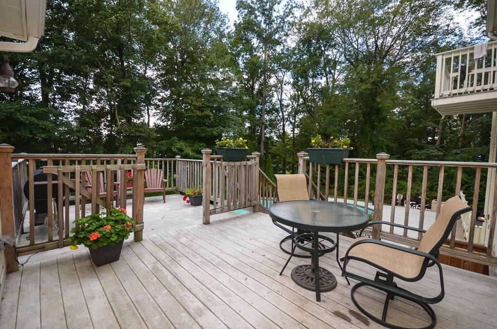 66 Dodge Hill Road Sutton, MA 01590 - Photo 25 of 29 a view of a chairs and table on the wooden floor