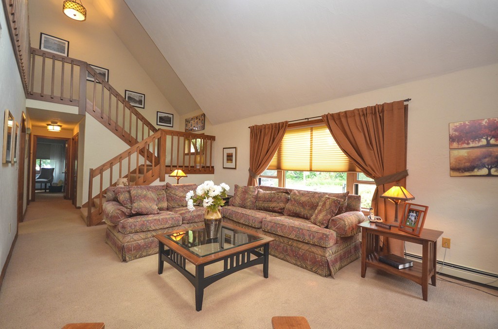 66 Dodge Hill Road Sutton, MA 01590 - Photo 4 of 29 a living room with furniture and a large window