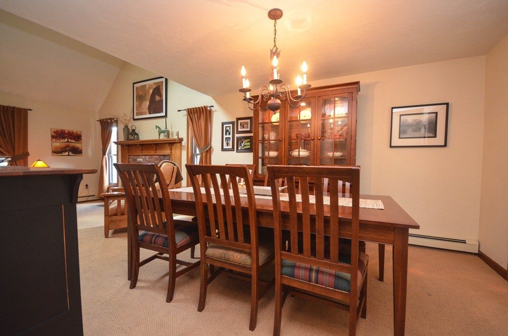 66 Dodge Hill Road Sutton, MA 01590 - Photo 6 of 29 a view of a dining room with furniture and chandelier