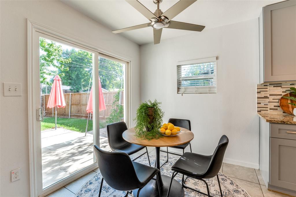 1209 Ridgeway Drive Richardson, TX 75080 - Photo 19 of 33 a view of a dining room with furniture window and outside view