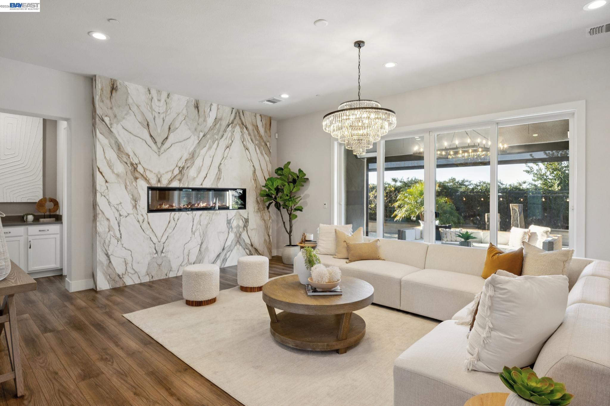 5 Harkness Circle Hayward, CA 94542 - Photo 1 of 1 a living room with furniture and a chandelier