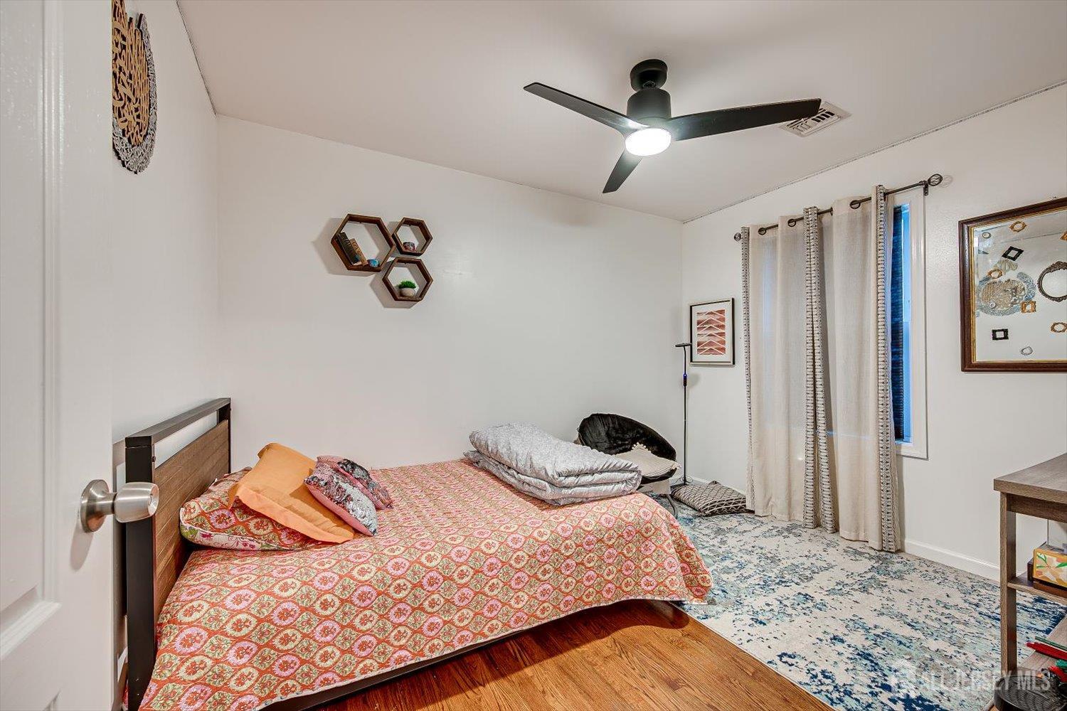 259 McFarlane Road Colonia, NJ 07067 - Photo 29 of 50 a bedroom with a bed and a window