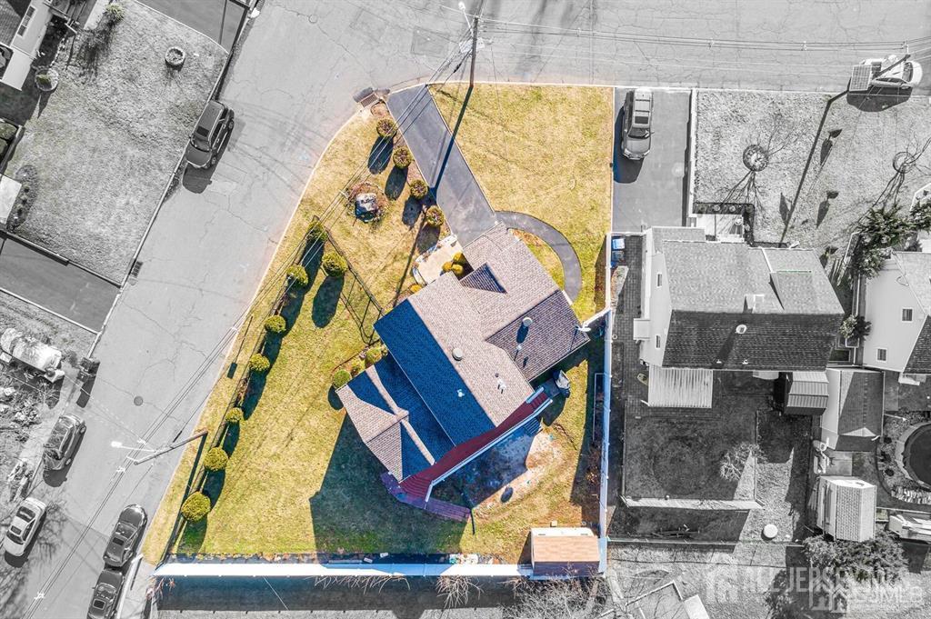 259 McFarlane Road Colonia, NJ 07067 - Photo 47 of 50 an aerial view of a house with a swimming pool