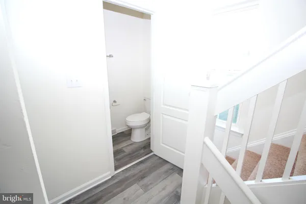 a bathroom with a sink and toilet