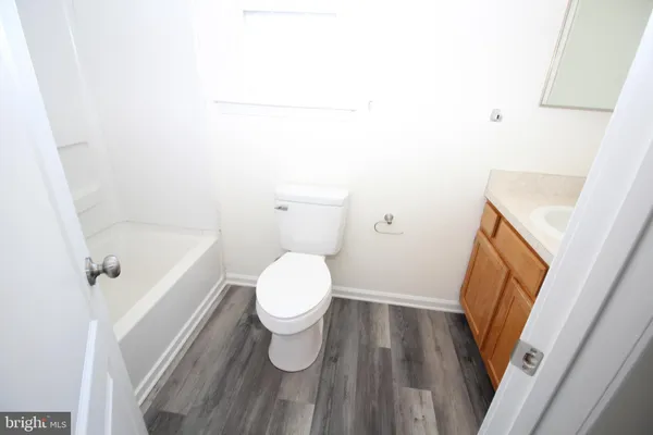 a bathroom with a sink and toilet