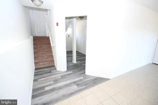 a view of a hallway with staircase