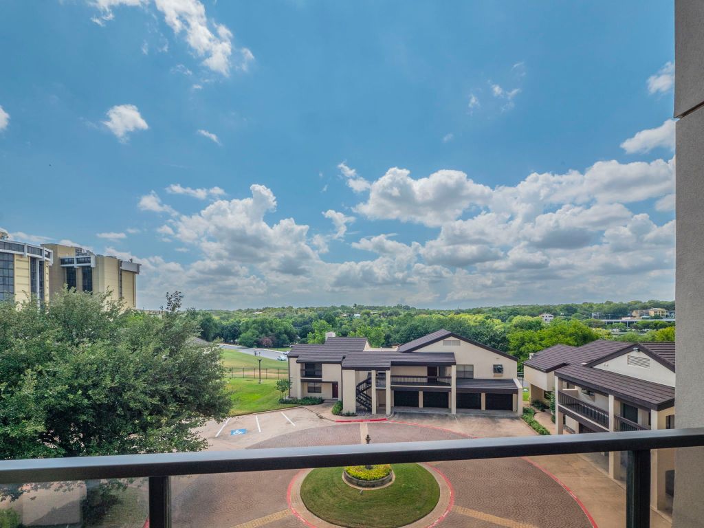 40 North Interstate Highway 35, Unit 4A4 Austin, TX 78701 - Photo 21 of 40 a house view with a garden space