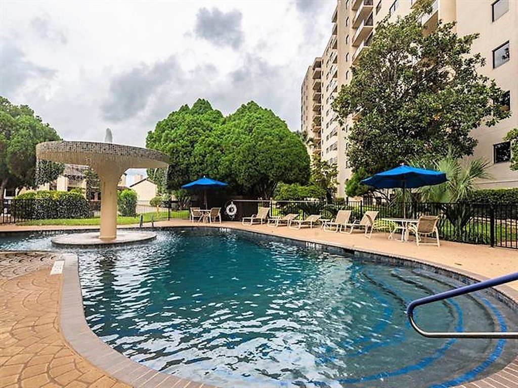 40 North Interstate Highway 35, Unit 4A4 Austin, TX 78701 - Photo 30 of 40 swimming pool view with a outdoor seating space