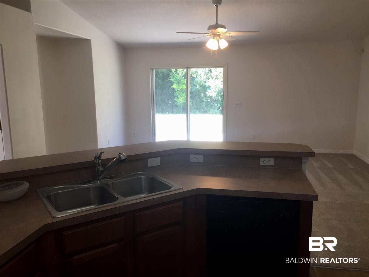 1900 South Bay Street Foley, AL 36535 - Photo 16 of 40 kitchen overlooking den