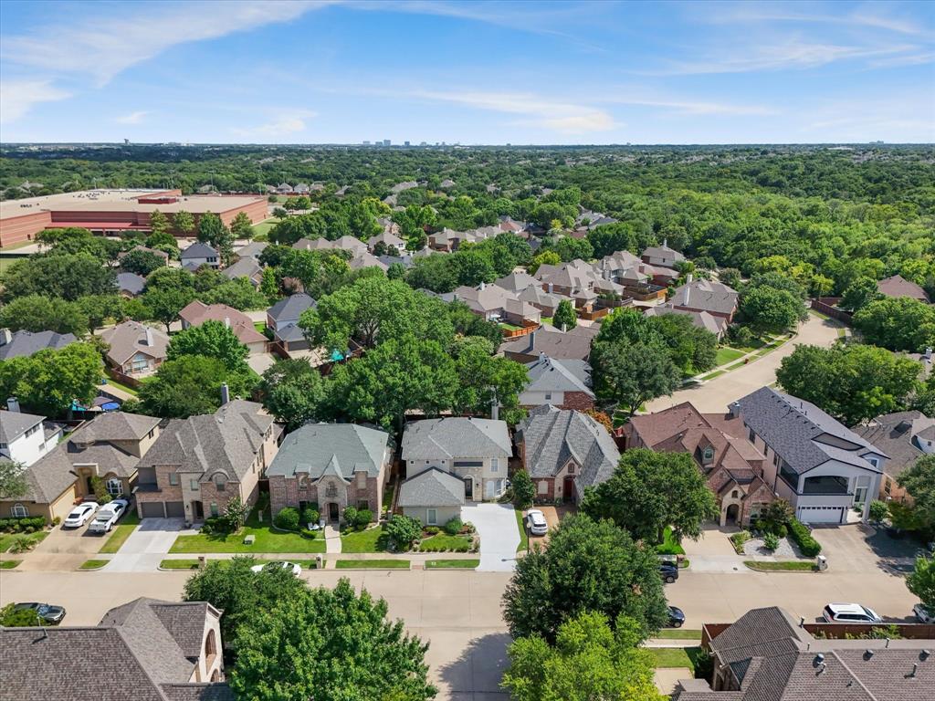 1615 Roma Lane Allen, TX 75013 - Photo 32 of 36 Aerial perspective of a residential neighborhood with tree-lined streets and varied architectural styles