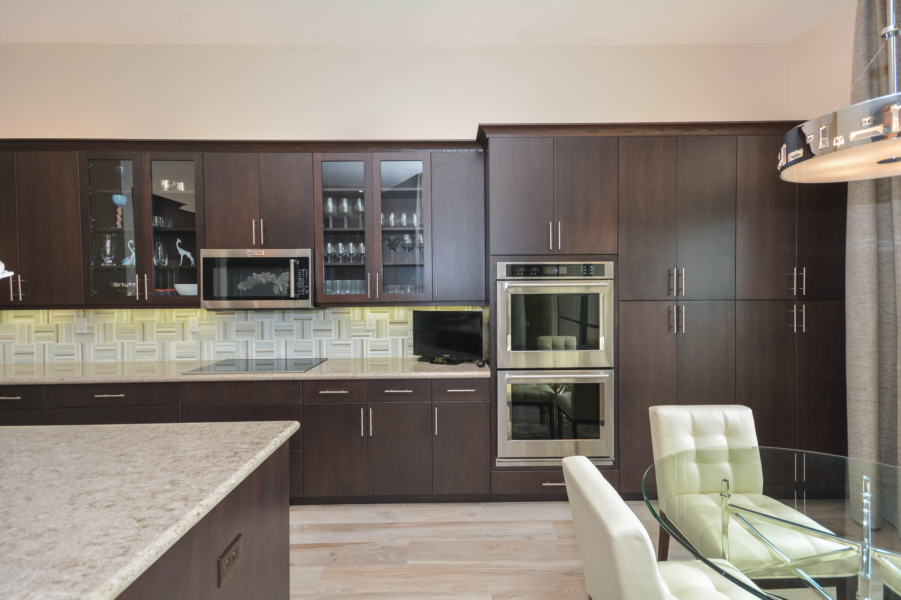 8290 Razorback Court Boynton Beach, FL 33473 - Photo 14 of 67 Wood Cabinetry With Glass Doors