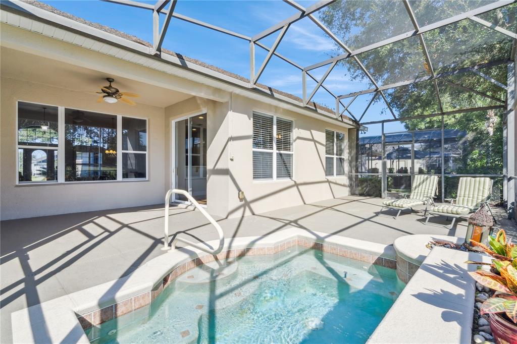 3823 Beacon Ridge Way Clermont, FL 34711 - Photo 36 of 57 a view of a house with backyard and sitting area