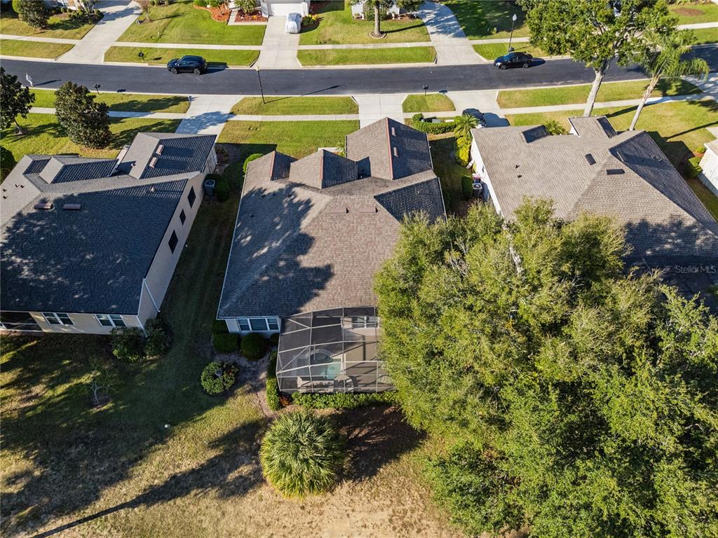 3823 Beacon Ridge Way Clermont, FL 34711 - Photo 43 of 57 an aerial view of a house with a swimming pool