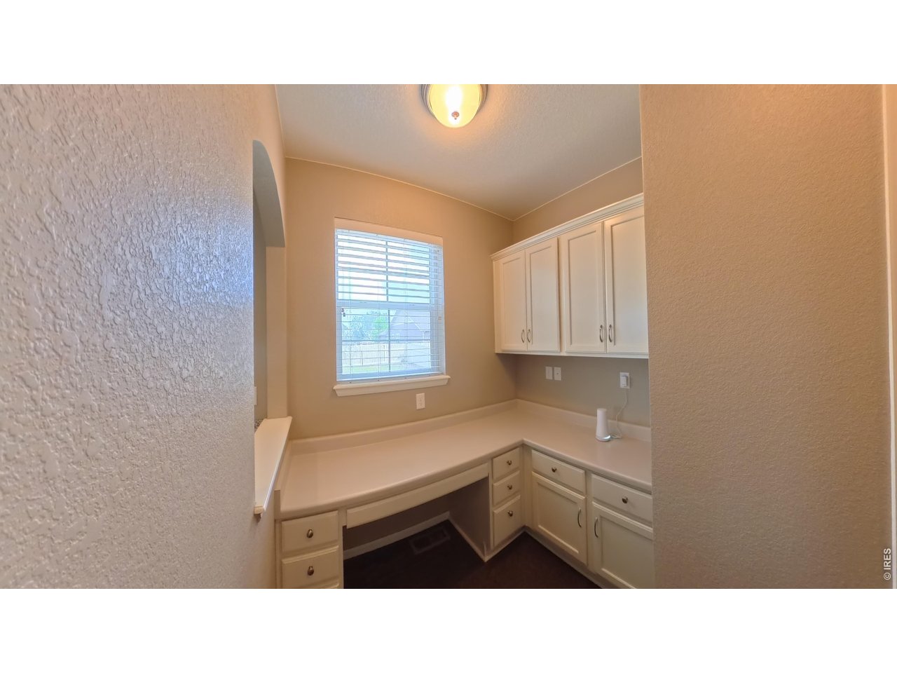 10434 Bluegrass Street Firestone, CO 80504 - Photo 10 of 26 Desk area behind kitchen