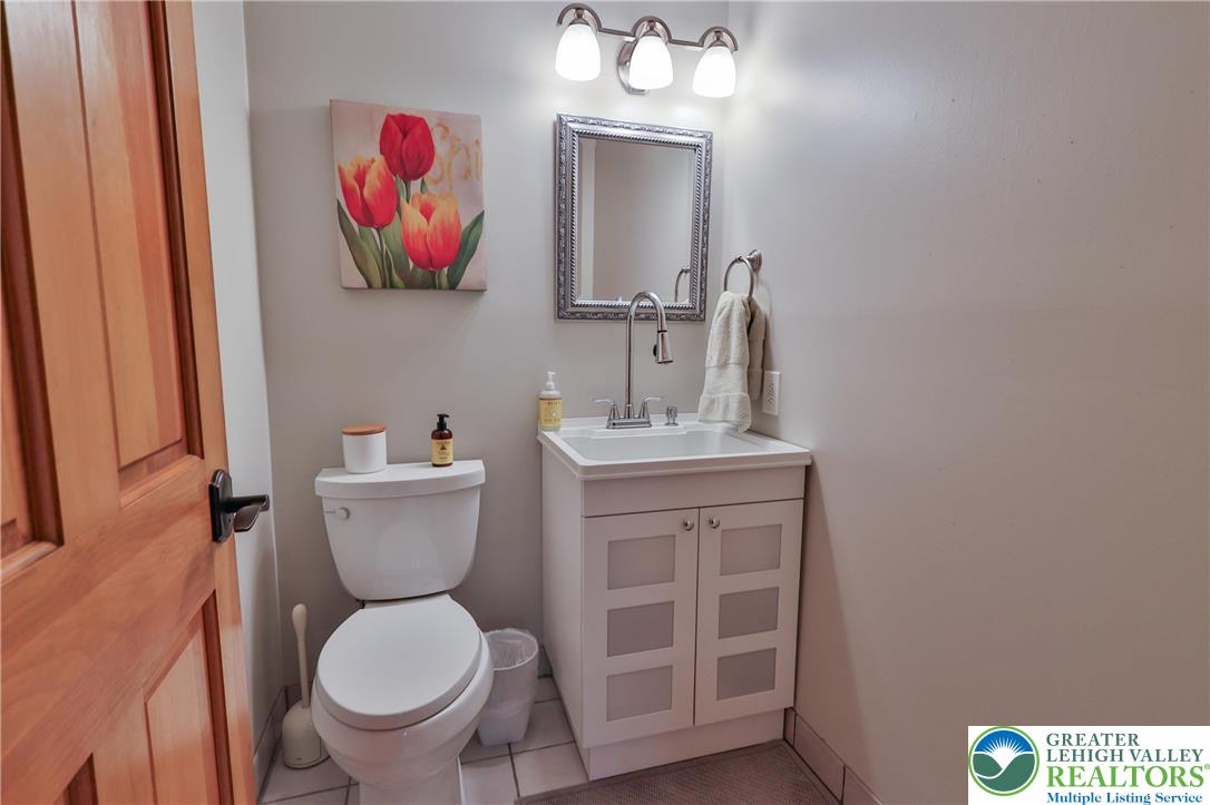 2159 Quarry Road Coopersburg, PA 18036 - Photo 47 of 79 Half bath with designer utility sink cabinet