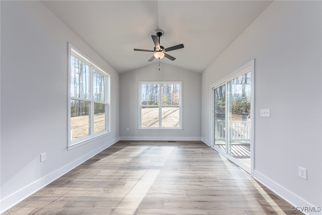 4801 Partlow Road Partlow, VA 22534 - Photo 12 of 30 Empty room with vaulted ceiling, ceiling fan, and