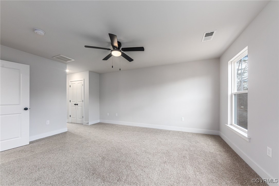 4801 Partlow Road Partlow, VA 22534 - Photo 14 of 30 Unfurnished bedroom with light carpet and ceiling