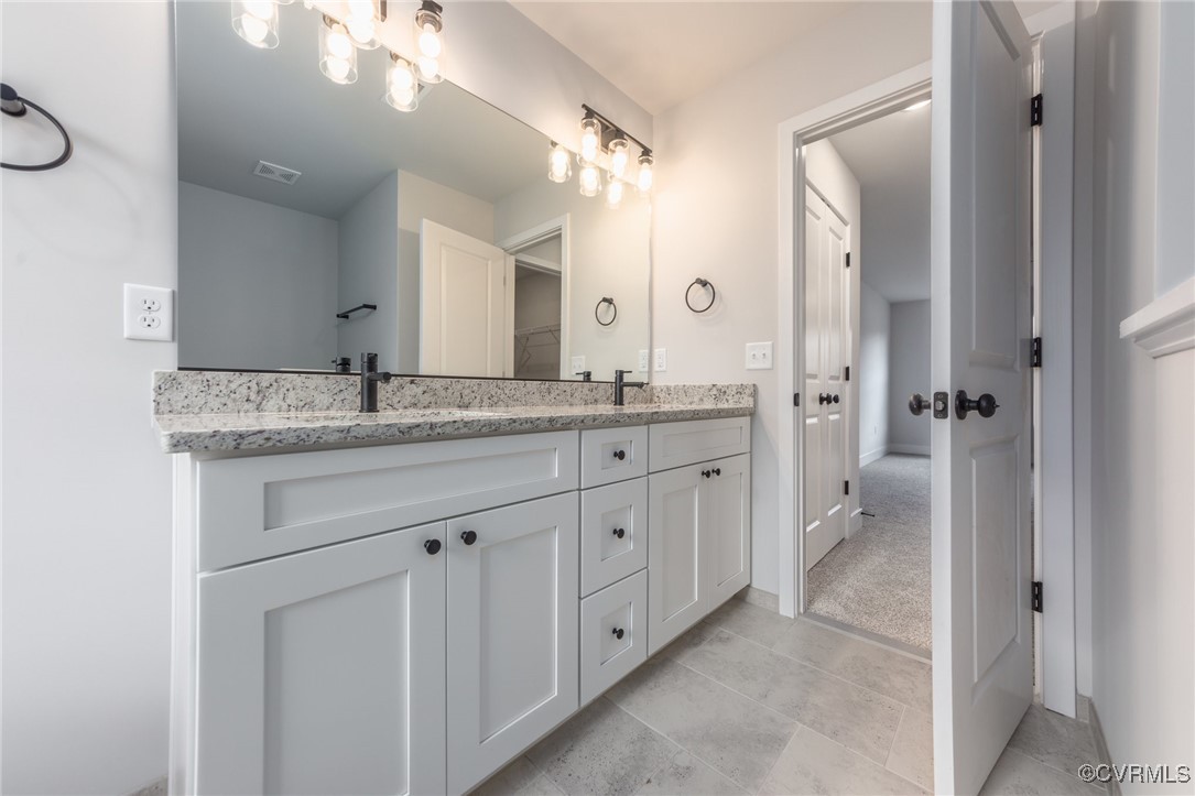 4801 Partlow Road Partlow, VA 22534 - Photo 18 of 30 Bathroom featuring tile patterned floors and dual