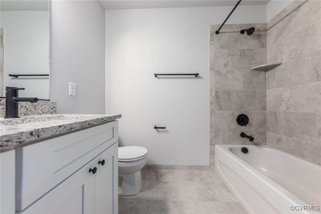 4801 Partlow Road Partlow, VA 22534 - Photo 26 of 30 Full bathroom with vanity, tiled shower / bath, ti