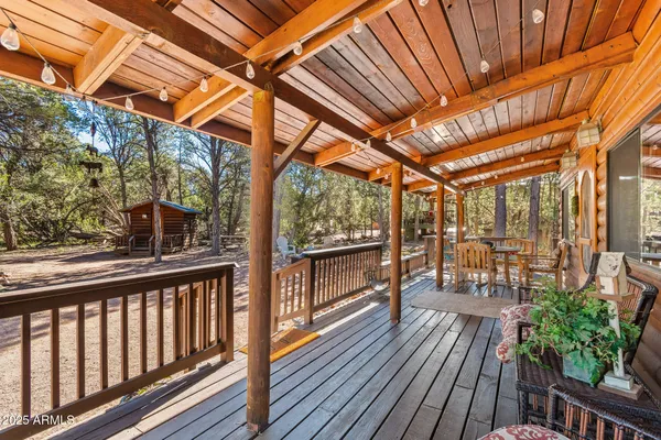a view of balcony with wooden floor