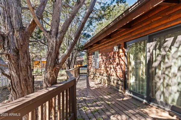 a balcony with view of the house