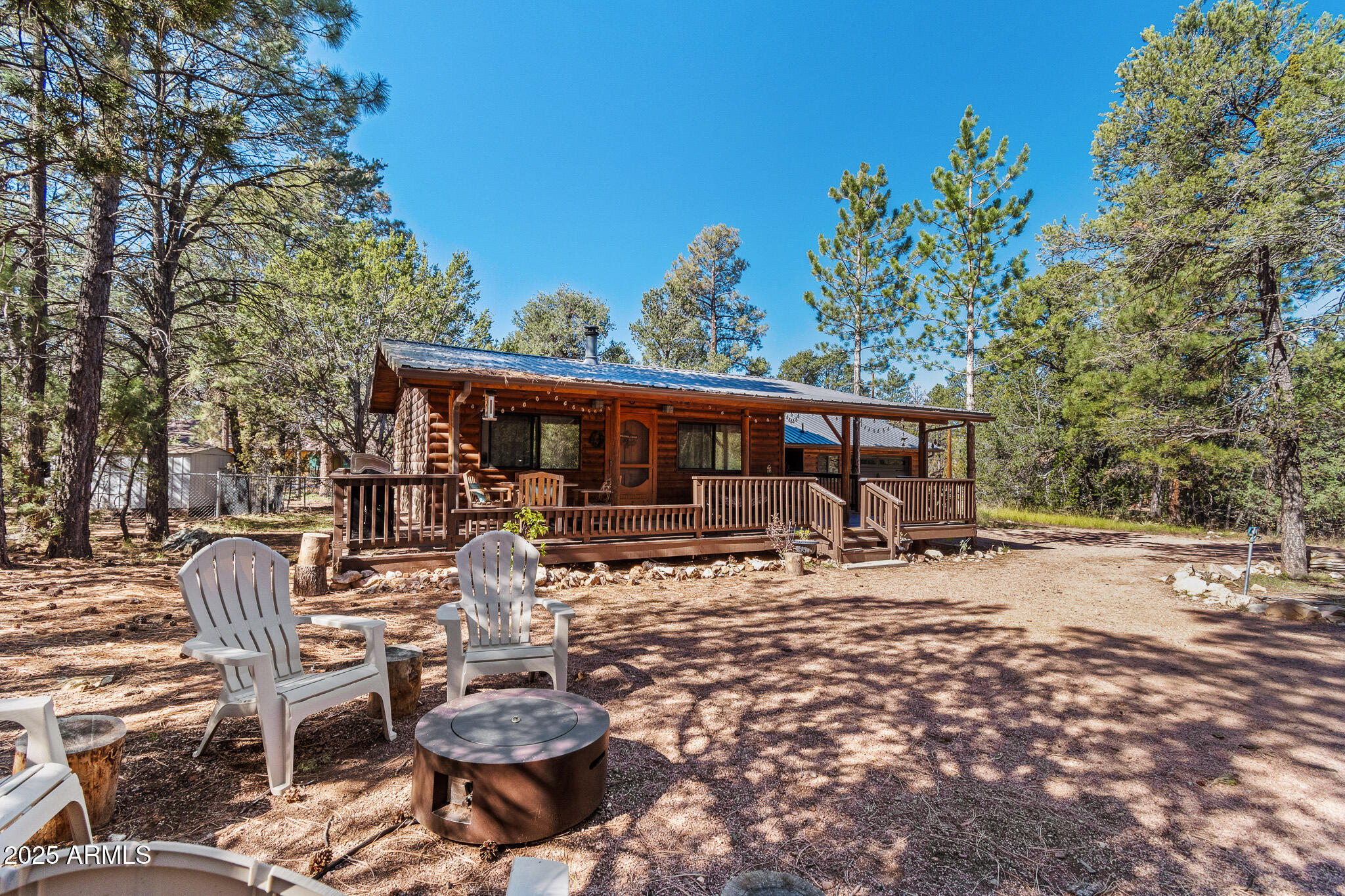 2948 Wildcat Trail Overgaard, AZ 85933 - Photo 31 of 38 a view of a yard with chairs