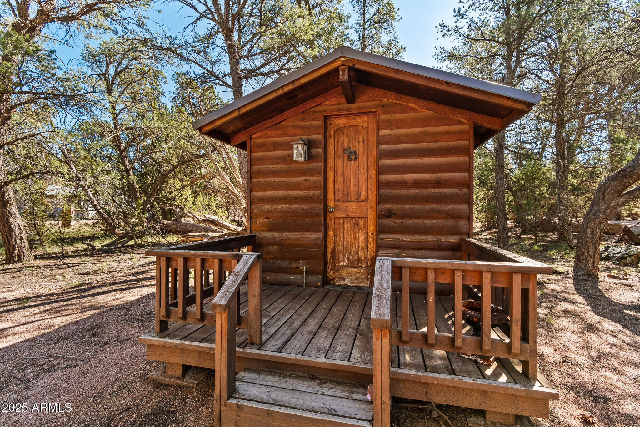 2948 Wildcat Trail Overgaard, AZ 85933 - Photo 33 of 38 a front view of a house with balcony