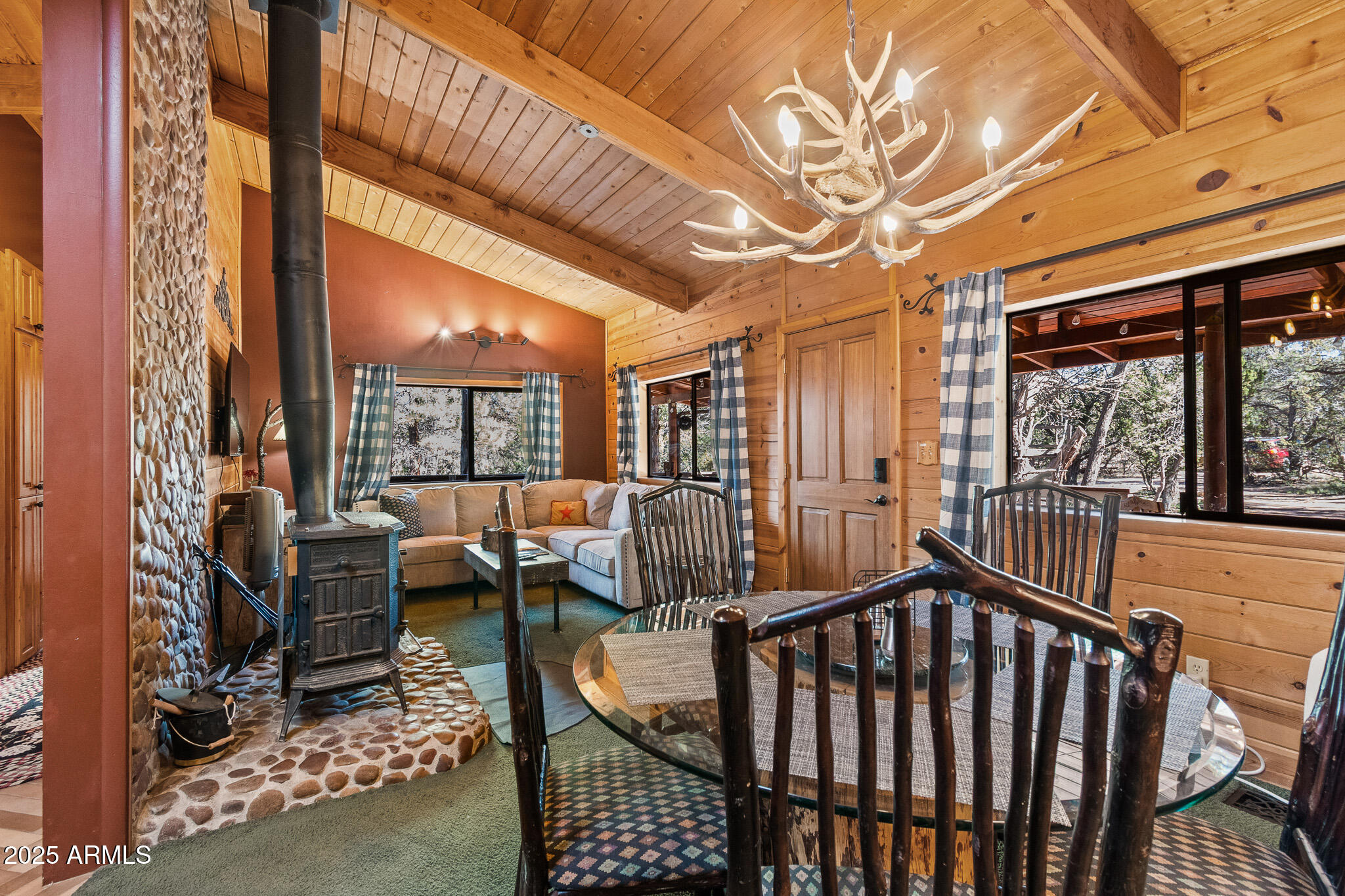 2948 Wildcat Trail Overgaard, AZ 85933 - Photo 4 of 38 a view of an chairs and table in the balcony
