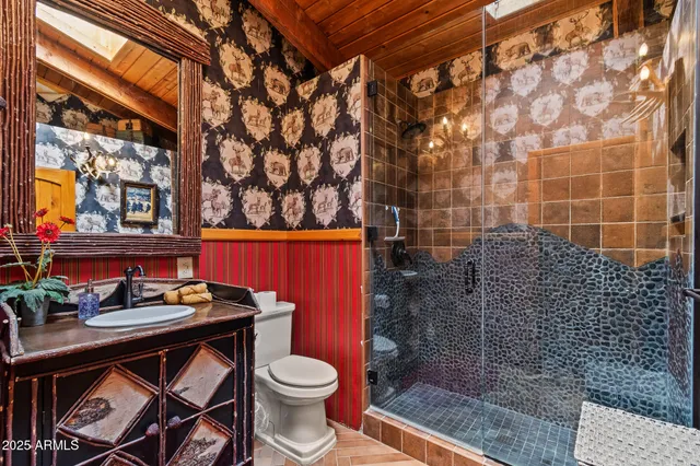a kitchen with stainless steel appliances granite countertop a stove and a refrigerator