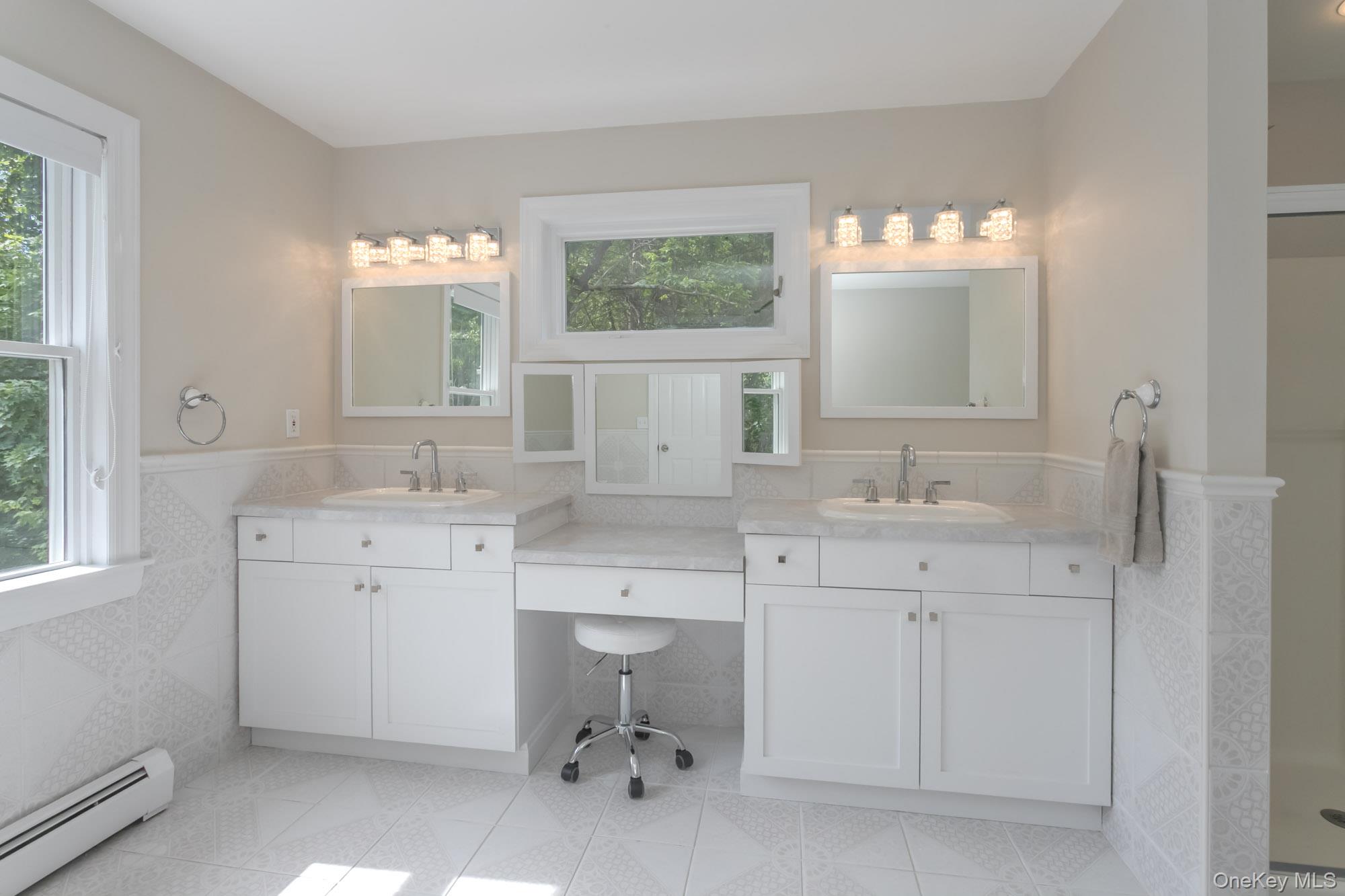 102 Beverly Road Chester, NY 10918 - Photo 30 of 49 a spacious bathroom with double sink a window and a mirror