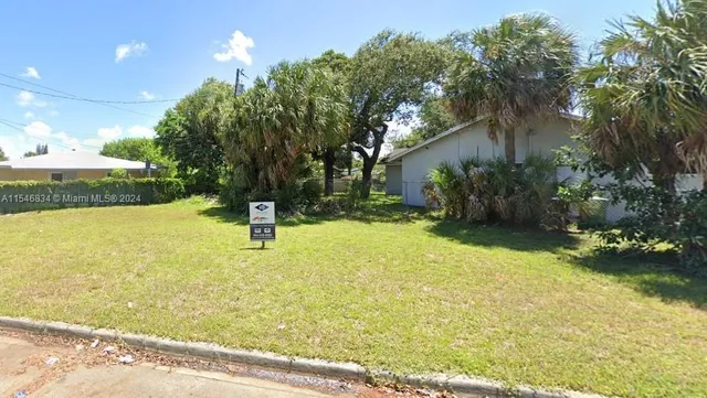a car parked in front of a house