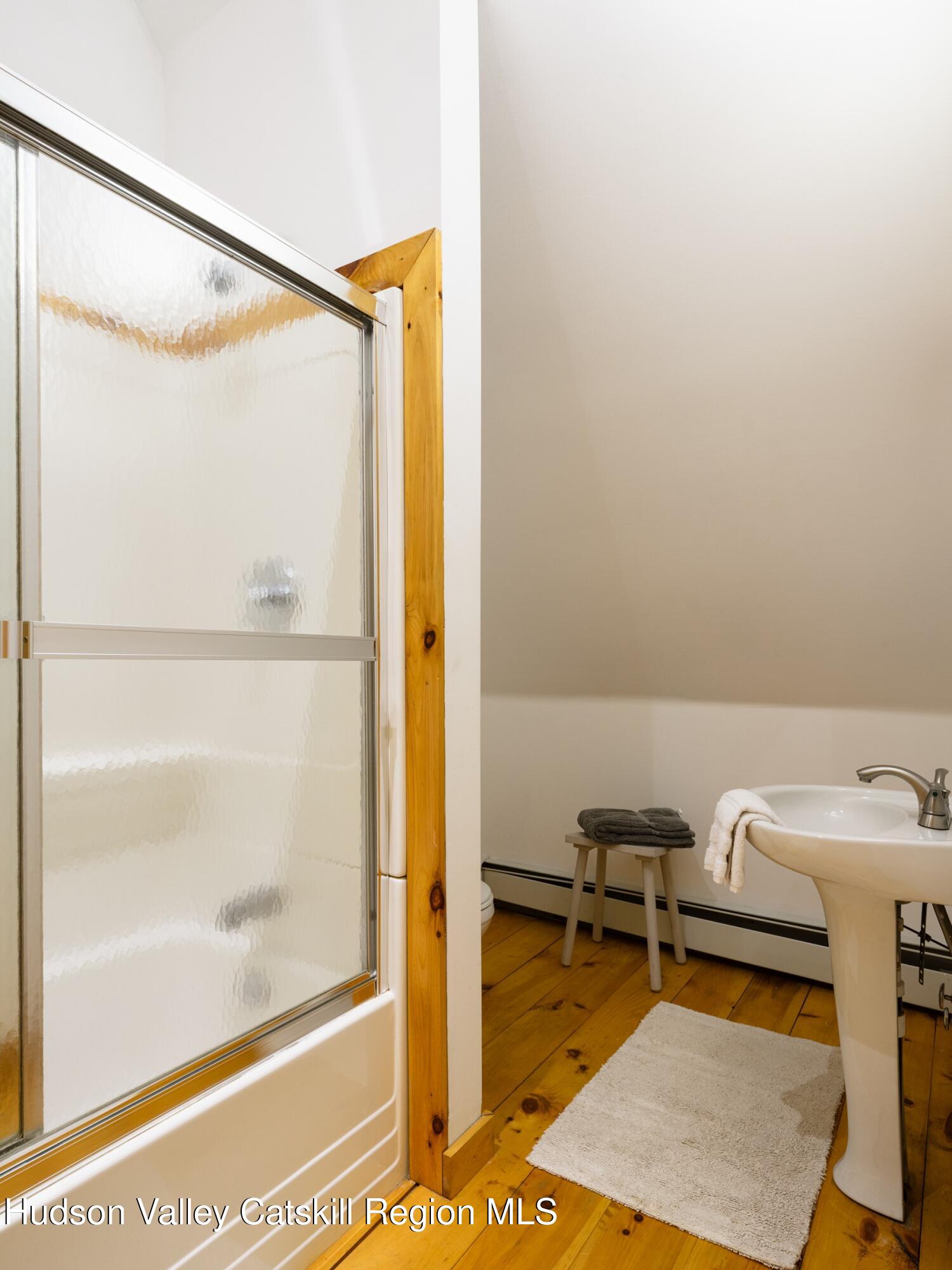 106 Tick Tock Way Stanfordville, NY 12581 - Photo 15 of 22 a bathroom with a sink and a mirror