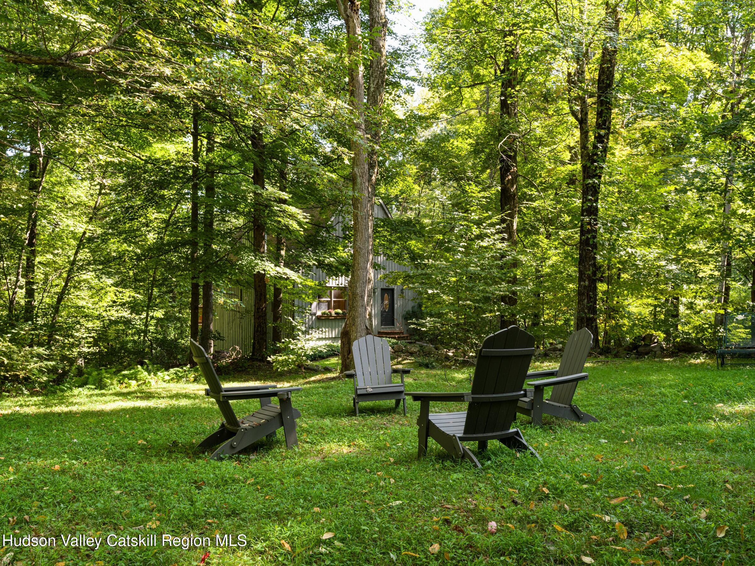 106 Tick Tock Way Stanfordville, NY 12581 - Photo 17 of 22 a view of a bench in a garden