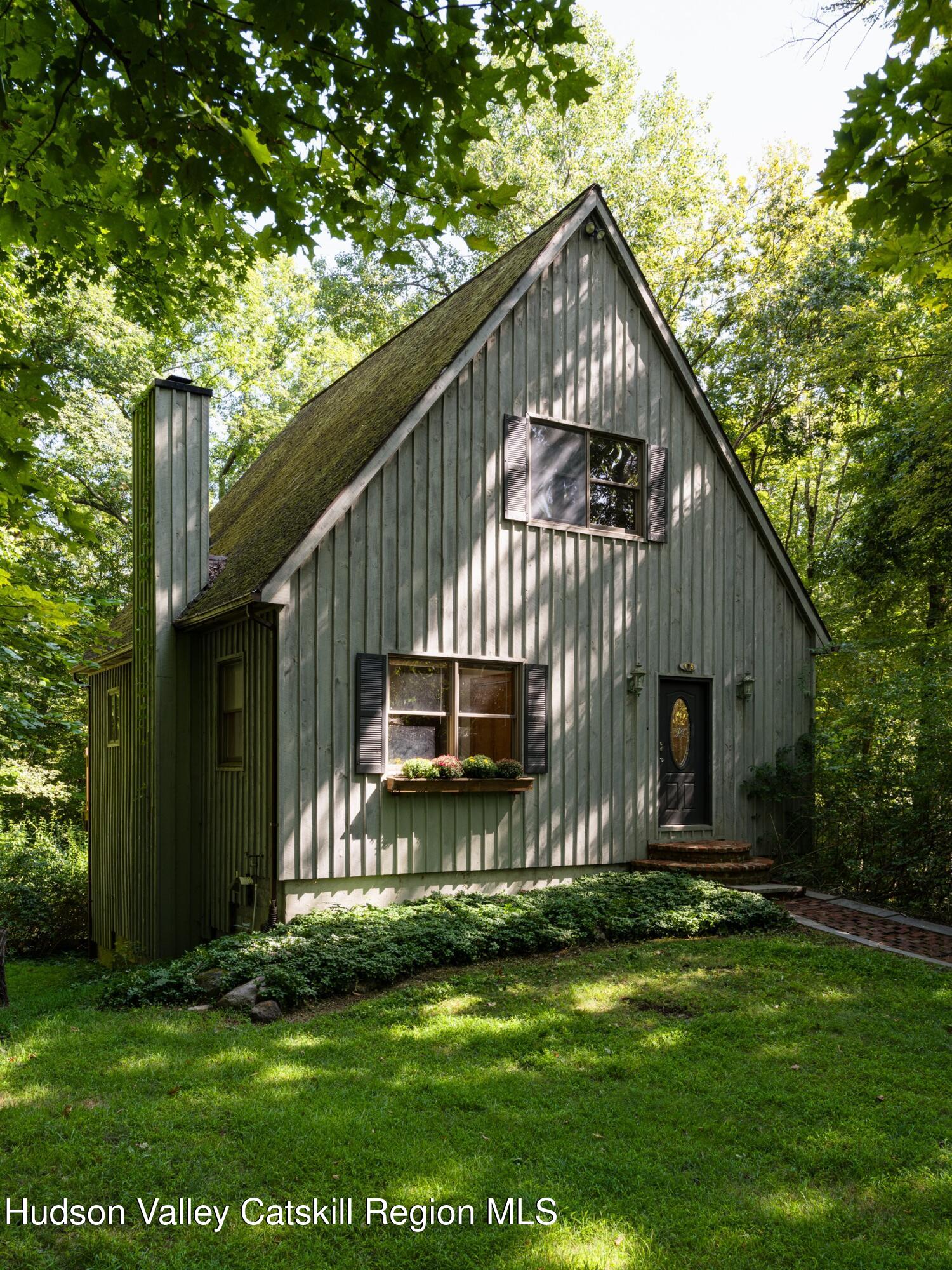 106 Tick Tock Way Stanfordville, NY 12581 - Photo 18 of 22 a front view of a house with a yard