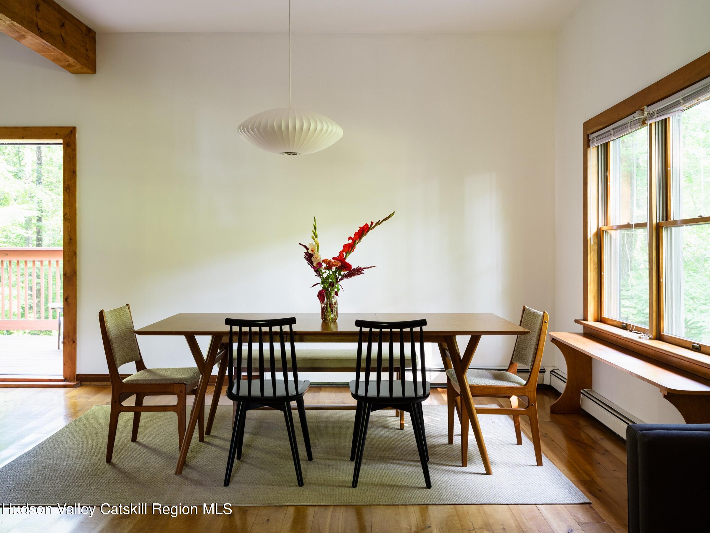 106 Tick Tock Way Stanfordville, NY 12581 - Photo 2 of 22 a dining room with furniture and window