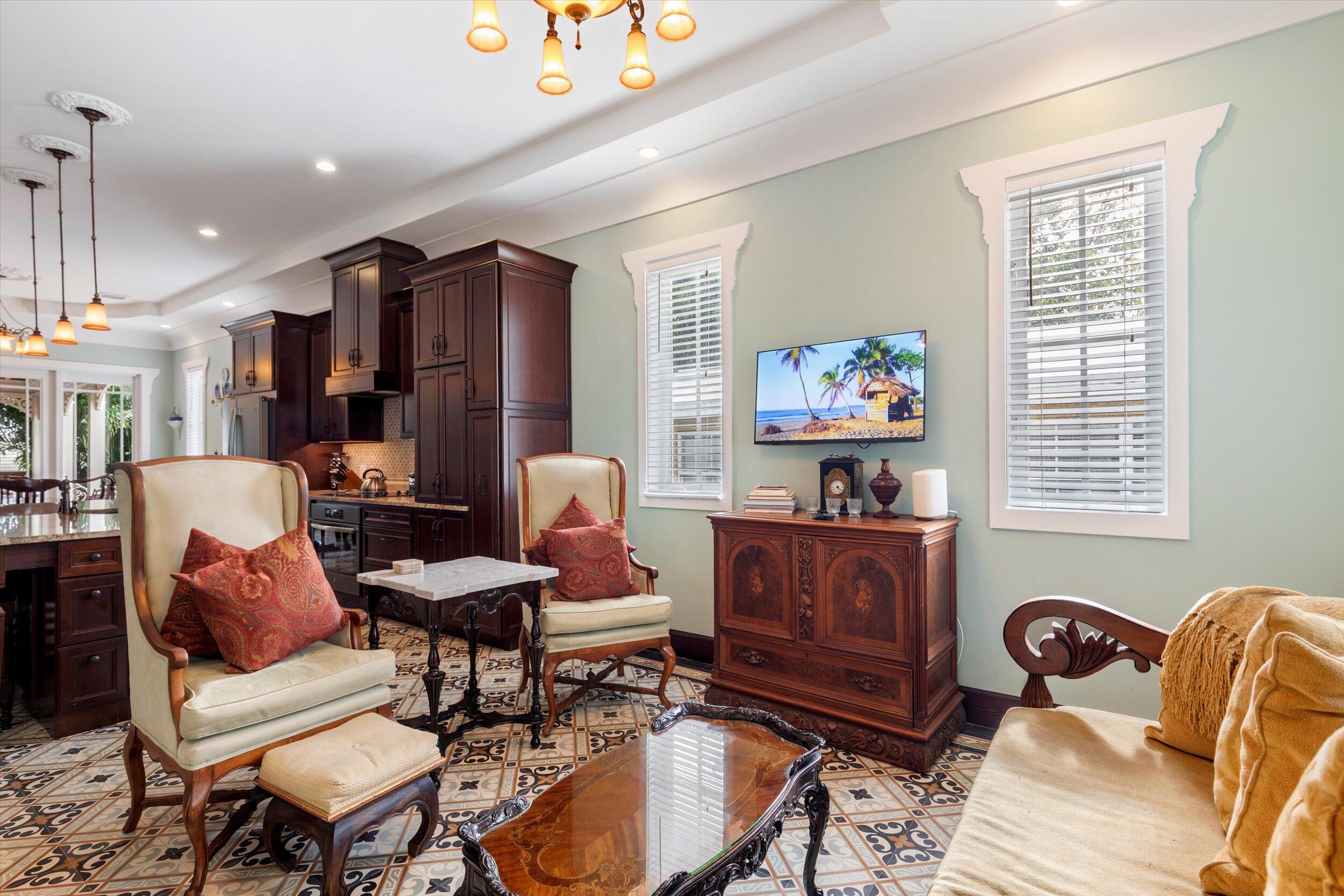 512 Amelia Street Key West, FL 33040 - Photo 7 of 52 a living room with furniture and a window